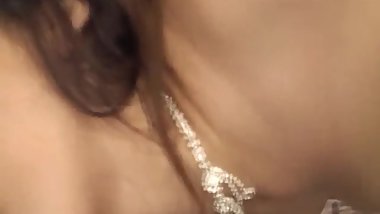 Minako Uchida looks dashing with two coks in her