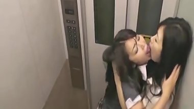 Japanese Lesbians kissing in elevator!