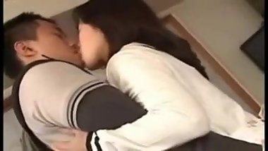Asian Housewife serves her Husband when he gets Home