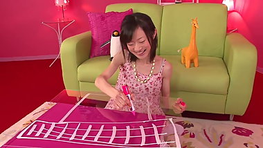 Japanese babe gets a toy in her tight pussy