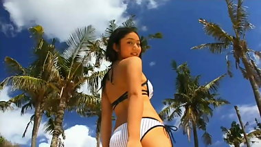 Irie Saaya -  beach in white bikini