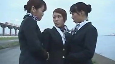 Three japanese airline stewardess kissing!