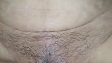 Japanese mature wife with hairy cunt swallows big dildo