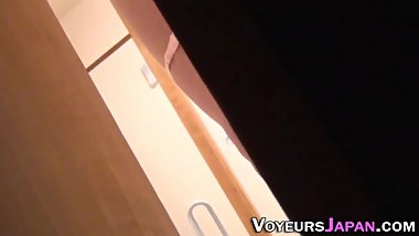 Japanese babe rubs clit