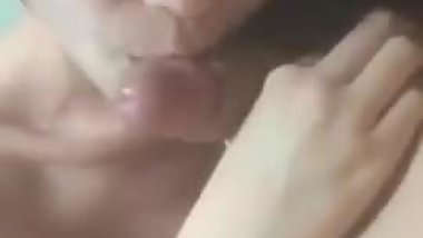 Asian girlfriend sucking cock