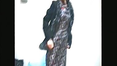 Japanese woman's wife taking off China dress