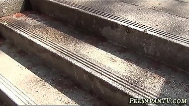 Asian ladies urinating