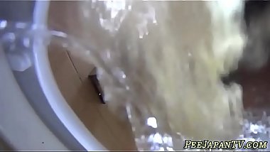 Asian teen pees on spycam