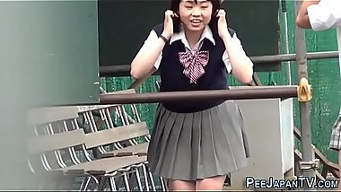 Kinky asians pee outside