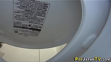 Asian gets watched peeing