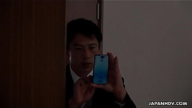 Office worker getting some juice up as her work gets boring