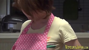 Asian seen toying pussy