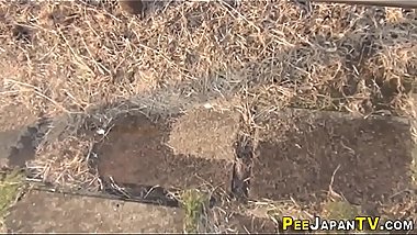 Asian relieves herself