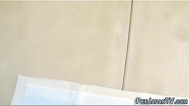 Japanese ho pees in cups